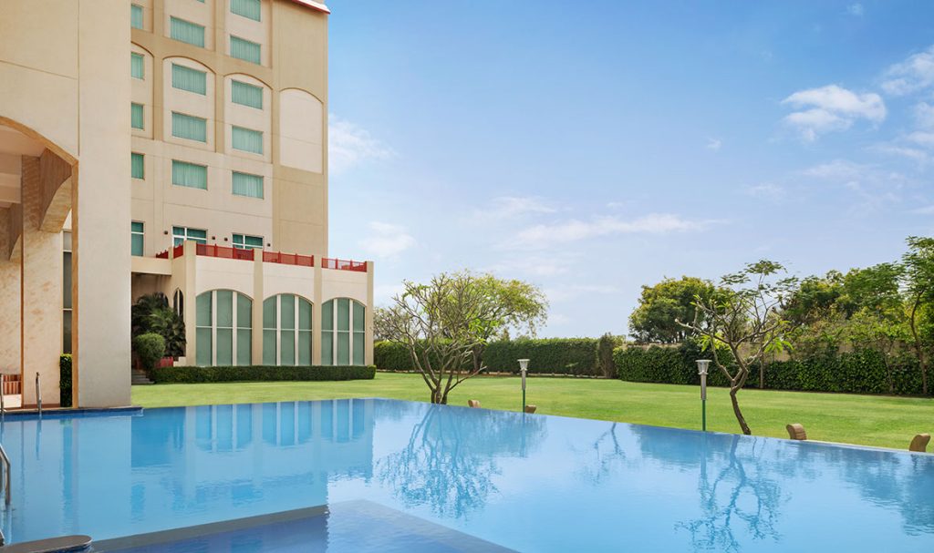 Ramada-by-Wyndham-Jaipur-Jaisinghpura---Pool- Outdoor-Wedding Venue